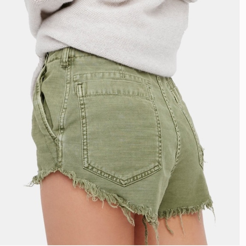Free People raw and patched stand off shorts